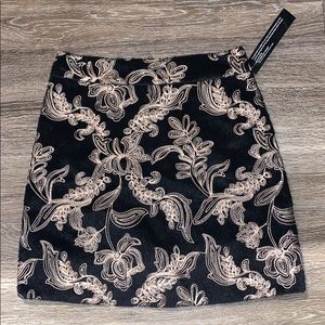 black and gold mini embroidered skirt